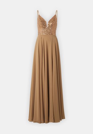 Rochie lungă, de culoare bej, cu un decolteu adânc în V și un bust decorat cu paiete. Fusta se desfășoară frumos, fiind confecționată dintr-un material moale și ușor.