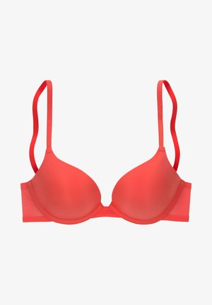 Coral underwire bra with smooth, molded cups, adjustable straps, and a seamless design. Features a textured back band for comfort.
