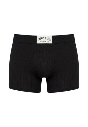 Sorte ribstrikkede Calvin Klein herre boxerbriefs med hvid logo-patch på linningen med teksten "Calvin Klein New York City."