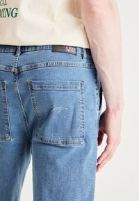 Denim Project SLOUCHY - Kratke hlače od trapera - blue