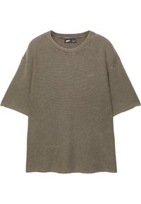 Olivenfarvet oversized kortærmet T-shirt lavet af ribbet stof, med rund halsudskæring og et lille broderet logo foran.