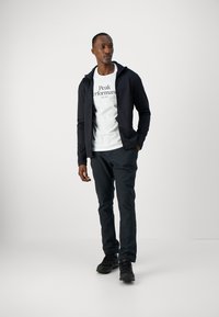 Peak Performance ORIGINAL TEE - Camiseta estampada - offwhite/black