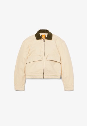 Beige cotton jacket with two front pockets, a dark green corduroy collar, and a full-length zipper. Short, slightly cropped design.