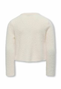 Teksturirana, skrajšana pulover v mehkem kremnem odtenku. Ima dolge rokave in okroglo izrez, izdelan je iz puhastega, lahkega materiala.