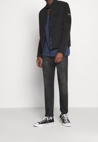 Calvin Klein Tunn jacka - black