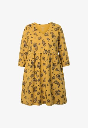 Mosterdgele jurk met zwart paisleypatroon, V-hals en driekwart mouwen, voorzien van een gathered taille en losse pasvorm.