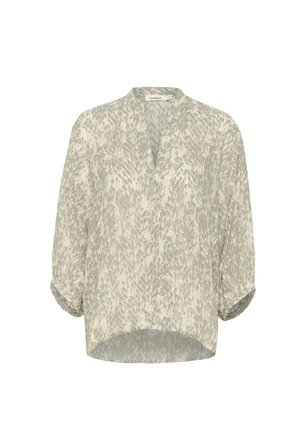 Blusa leggera beige con un sottile motivo astratto grigio, scollo a V, maniche a tre quarti e orlo arrotondato. Tessuto morbido e texturizzato.