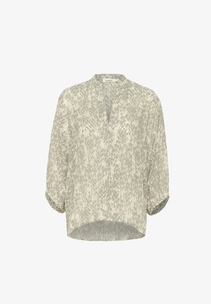 Blusa leggera beige con un sottile motivo astratto grigio, scollo a V, maniche a tre quarti e orlo arrotondato. Tessuto morbido e texturizzato.