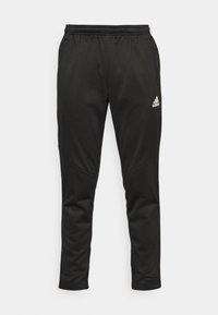 Černé sportovní kalhoty vyrobené z měkké látky, se širokým elastickým pasem, zúženými nohavicemi a malým bílým logem Adidas na horní levé straně.