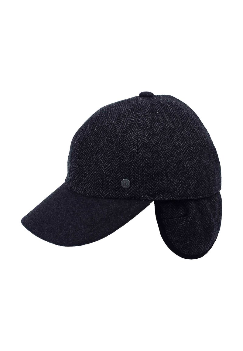 Dark grey herringbone cap with a curved brim, ear flaps, and a small circular logo on the side, made from textured wool blend material.
