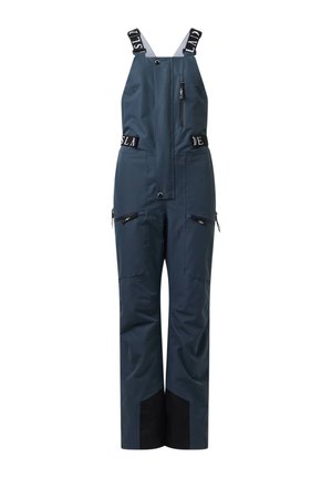 Pantalon à bavette imperméable bleu foncé avec poignets noirs renforcés, plusieurs poches zippées et bretelles ajustables avec texte blanc contrastant.