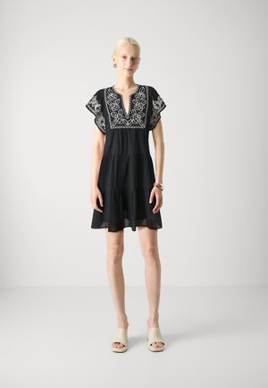 Black dress with short, flutter sleeves and a deep V-neck, featuring white floral embroidery. Lightweight fabric with a relaxed fit.