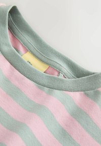 Striped short-sleeve shirt with pink and green horizontal stripes, featuring a rounded collar and soft fabric texture. Tag visible inside.