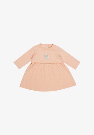 Peach-colored dress with long sleeves, featuring a gathered waist and a cute animal embroidery on the chest. Small polka dot pattern throughout.