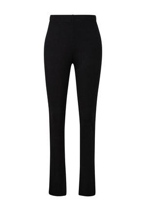 Leggings neri in un tessuto liscio e elasticizzato. Presentano una vita alta e un design a gamba dritta, senza cerniere o tasche visibili.