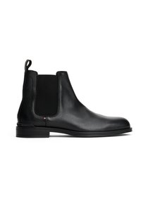 Sorte skinn Chelsea-boots med elastiske sidepaneler, en løftestang og en jevn overflate. Definert form med en lav stablet hæl.