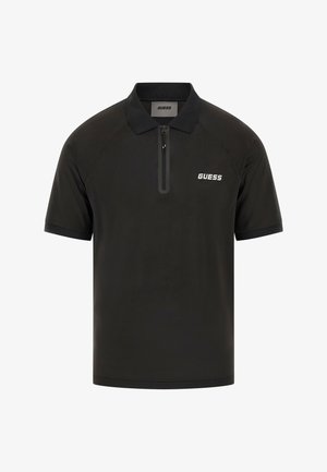 Polo nero realizzato in tessuto testurizzato, caratterizzato da una zip parziale, maniche corte e un logo bianco sul lato sinistro del petto.