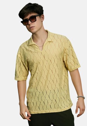- Koszulka polo