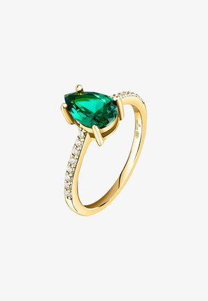 Anello d'oro con una pietra verde a forma di pera circondata da piccoli zaffiri chiari lungo la fascia, con una finitura liscia e lucida.
