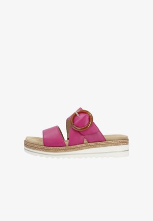 Rosa Leder-Sandale mit breiten Riemen und einem runden Bernstein-Akzent. Verfügt über eine dicke, weiße Plattformsohle mit strukturiertem Finish.