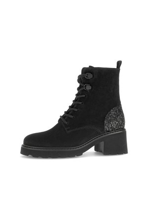 Black suede ankle boots featuring a lace-up front and a chunky heel. The back panel has a sparkly accent detail for added texture.