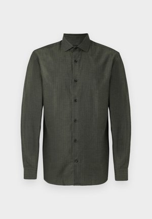 Oliwkowa, długosleeve, koszula zapinana na guziki z klasycznym kołnierzykiem i siedmioma czarnymi guzikami z przodu.