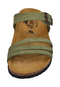 Green suede sandal with three straps and a metal buckle. Features a memory cushion footbed and a textured, dark rubber sole.