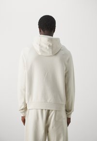 EA7 Emporio Armani UNISEX beżowy