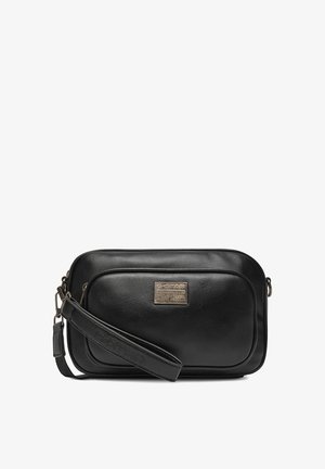 Bolso bandolera rectangular de cuero negro con bolsillo frontal con cremallera, correa desmontable y placa metálica con el logo de G-Star Originals.
