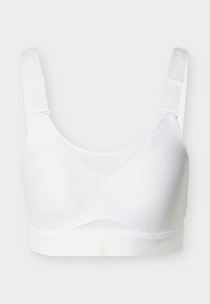 Hvid sports-bh med justerbare stropper med Under Armour-logo, glat stof og elastisk støttebånd i bunden.