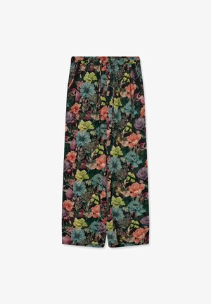 Széles szárú nadrág rugalmas derékrésszel és színes virágmintával, amely zöld, kék, narancssárga és lila virágokat ábrázol sötét alapon.