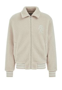 Gaučasta, bež skraćena bomber jakna izrađena od plišanog materijala; sadrži prednji zip, mekano kragnu i rebraste prugaste manžete i donji rub. Prisutan detalj s logotipom.