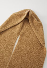 Brown wool scarf with a soft, textured finish. Features a smooth, folded edge and an open slit in the center for easy wear.