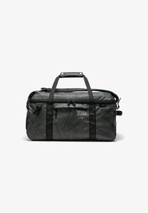 Sac de sport noir et vert avec un motif camo texturé, double poignées, bandoulière et zippers. Logo Herschel sur le devant.
