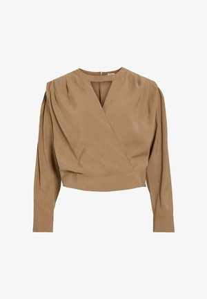 Blouse portefeuille en tissu doux de couleur brun clair. Caractérisée par des manches longues bouffantes, un décolleté en V profond et un ourlet court avec de légers plis.