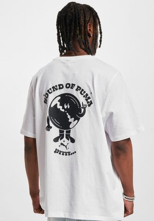 White cotton t-shirt featuring a large black graphic of a globe with cartoonish details and the text "SOUND OF PUMA" on the back.