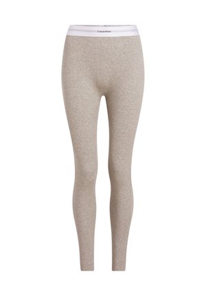 Sive bombažne legging hlače z belim elastičnim pasom, na katerem je logo "Calvin Klein". Ozek, prilagojen kroj, mehak tekstura po celotni hlači.