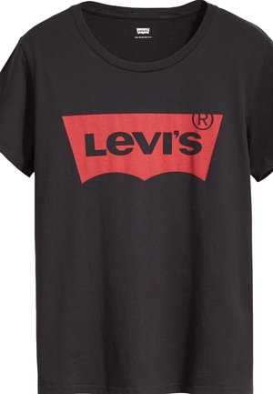 Camiseta de algodón negra con cuello redondo, que presenta un audaz logo rojo de Levi's en forma curva en la parte frontal. Manga corta, corte clásico.