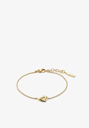 Bracelet en chaîne d'or délicate avec un pendentif cœur creux au centre et un fermoir ajustable orné d'une petite étiquette gravée "JETTE".