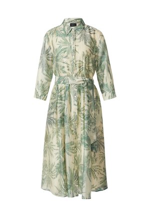 Robe mi-longue boutonnée avec col et ceinture à la taille, avec un motif de feuille de palmier verte sur fond beige clair.