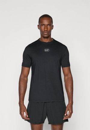 TENNIS PRO TEE - Sports T-shirt - black