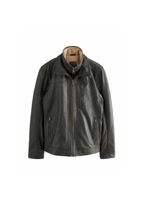 Black leather jacket featuring a high collar, zippered front, and two zippered side pockets; lined with a tan, synthetic fur material.