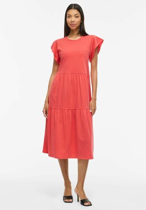 Vestido coral hasta la rodilla con mangas cortas con volantes, cintura fruncida y falda de varios volantes. Material de algodón liso con un ajuste relajado.