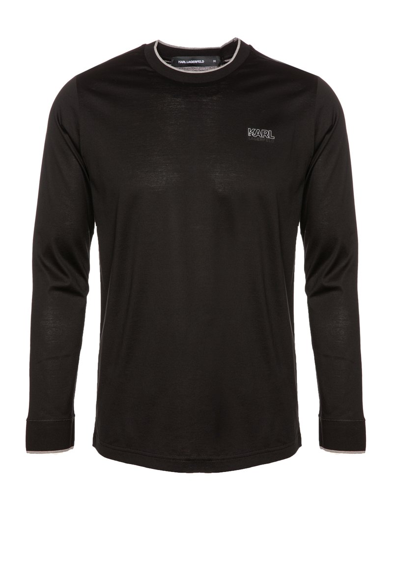 Czarna długo rękawowa koszula z miękkiego materiału, z okrągłym dekoltem i białymi przeszyciami. Logo "KARL" na lewej piersi.