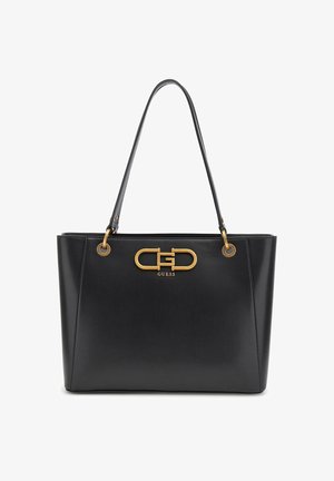 Sac cabas en cuir noir avec doubles bretelles et plaque avec logo Guess doré au centre devant.