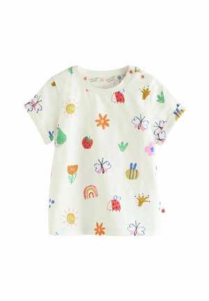 Kurzärmliges, rundhalshalsiges Baumwoll-T-Shirt in Creme mit bunten Mustern von Früchten, Blumen und Insekten. Mit Druckknopfdetail an der Schulter.