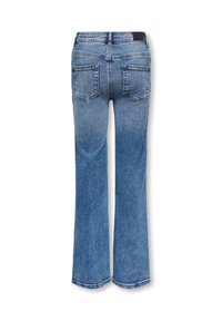 Mėlynos džinsinės kelnės, praplėsto pėdkelnės dizaino, su dviem užpakalinėmis kišenėmis ir išblukusia skalbimo tekstūra. Matoma siūlės detalė.