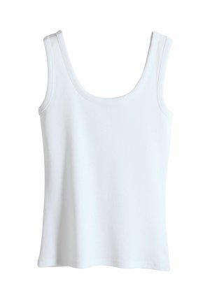 Top sin mangas blanco hecho de tela acanalada; presenta un escote redondeado, tirantes anchos y un corte relajado con un dobladillo recto.