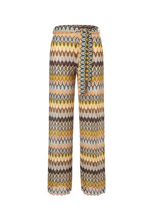High-waisted pants with a multicolored zigzag pattern in yellow, brown, blue, and beige, featuring a matching fabric belt tied at the waist.