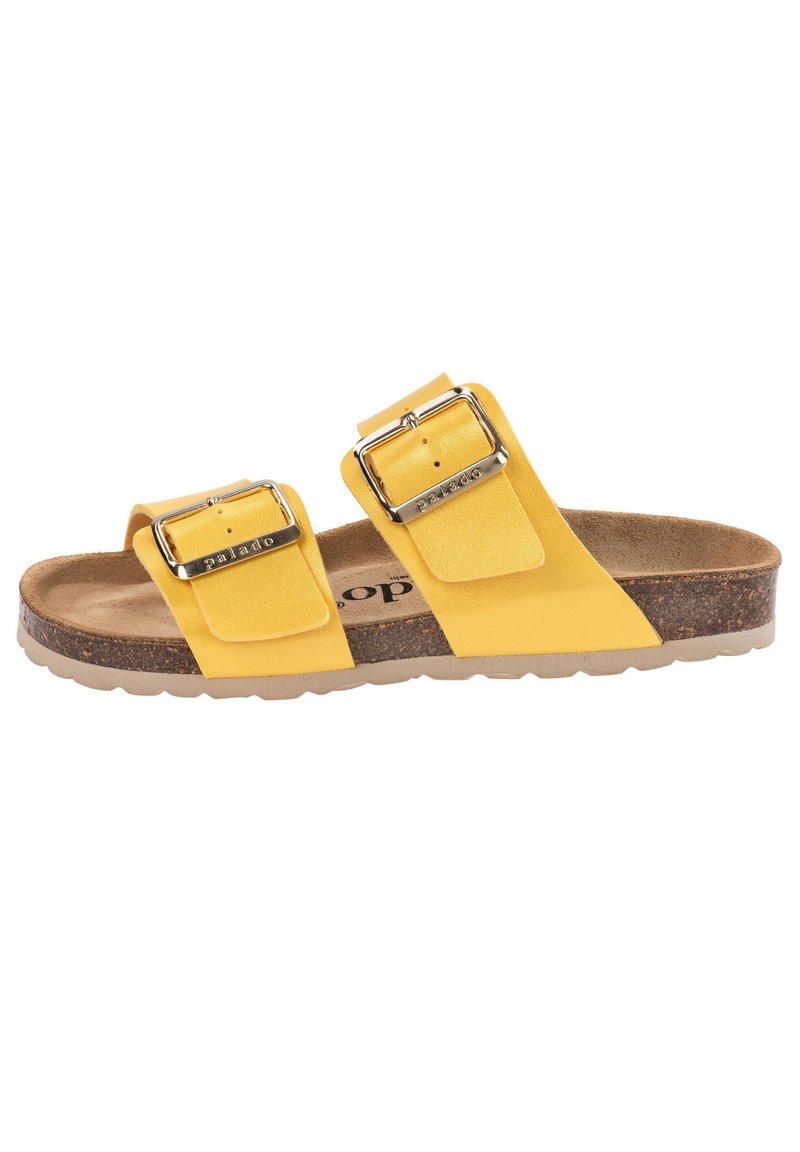 Sandales jaunes avec deux brides ajustables et boucles en argent, semelle en liège et semelle en caoutchouc ; design plat pour un usage décontracté.